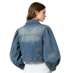 Balloon sleeve women's denim jacket sleeve stitch construction fabric gathering and cuff macro close-up