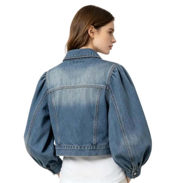 Balloon sleeve women's denim jacket sleeve stitch construction fabric gathering and cuff macro close-up