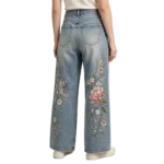 Embroidered floral denim women's stitch count thread quality and fabric grain macro close-up detail