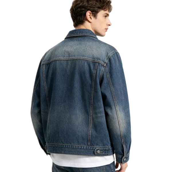 Heavyweight men's denim chore coat reinforced stitch detail fabric weight and pocket construction macro close-up