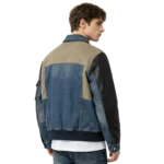 Mixed media men's denim bomber jacket fabric contrast seam join and rib texture macro close-up