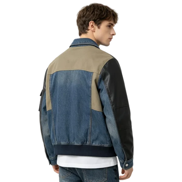 Mixed media men's denim bomber jacket fabric contrast seam join and rib texture macro close-up