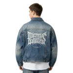 Oversized trucker men's denim jacket custom metal button hardware and washed fabric macro close-up