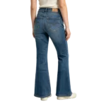 Slim bootcut women's stretch denim fabric recovery weave and hem finish macro close-up detail
