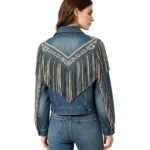 Western women's fringe denim jacket fringe trim texture denim fabric and yoke seam macro close-up