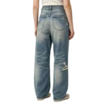 Y2K baggy jeans women frayed raw hem edge denim fabric texture and wash effect detail